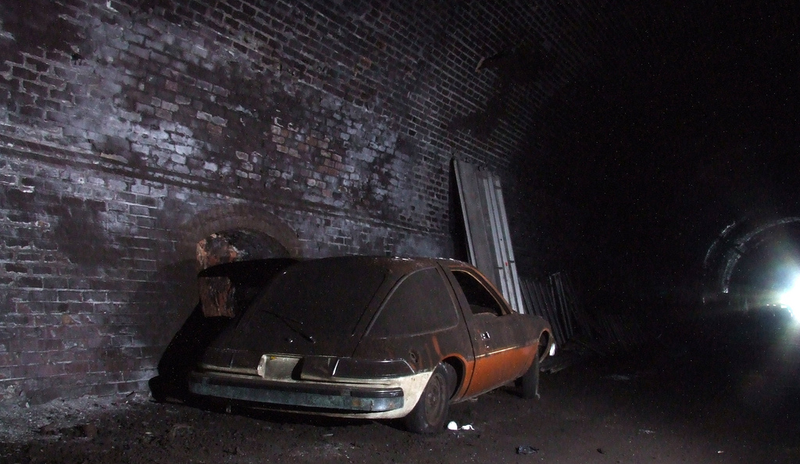 Illustration for article titled A Collapsed Old Railway Tunnel Hides These Rare Cars